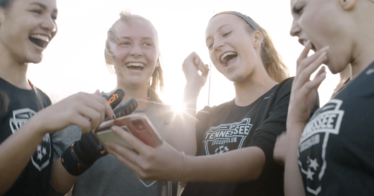 Players watching and observing a recording made by a Veo camera.